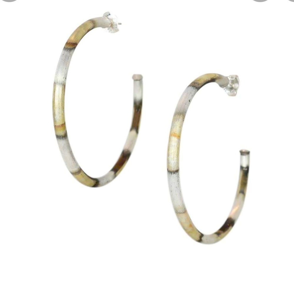 Sheila Fajil everyday hoops. Burnished silver